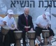 נשיא המדינה אזרחי ישראל וענפי הזית מתחת לסוכה